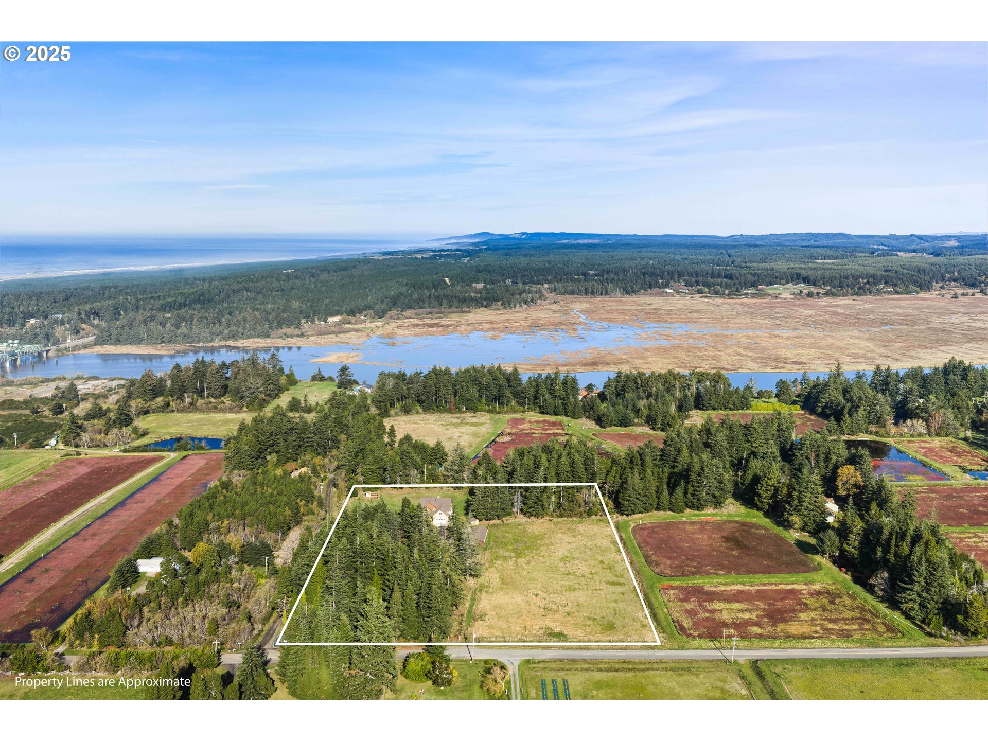 55942 Lost Valley Road Bandon, OR 97411 - Photo 47 of 48 a view of a city and ocean view