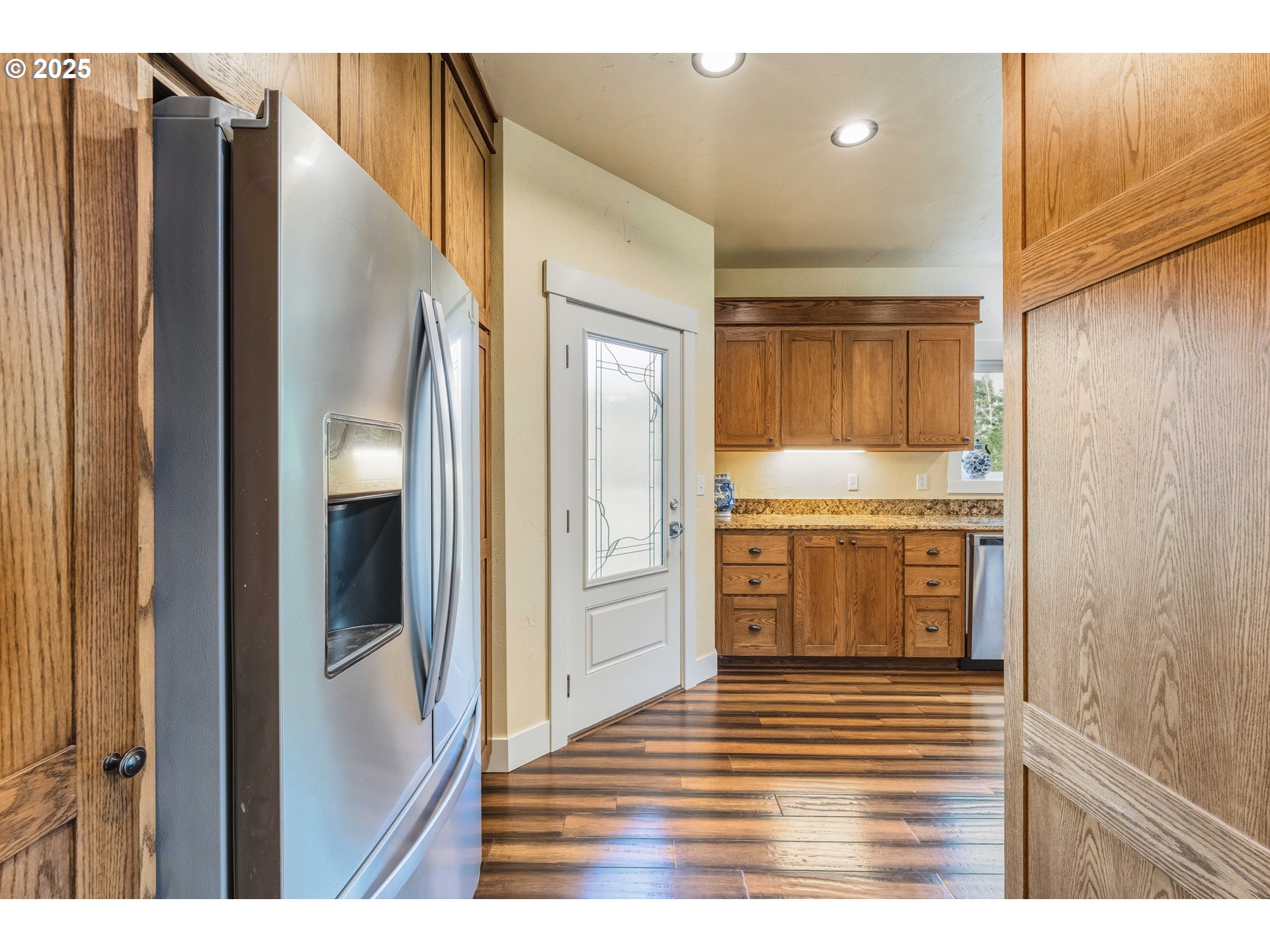 55942 Lost Valley Road Bandon, OR 97411 - Photo 10 of 48 a view of a kitchen from the hallway