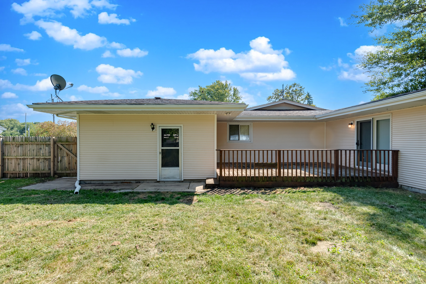 248 West Kennedy Road Braidwood, IL 60408 - Photo 25 of 26 a view of a house with a small yard and a large tree