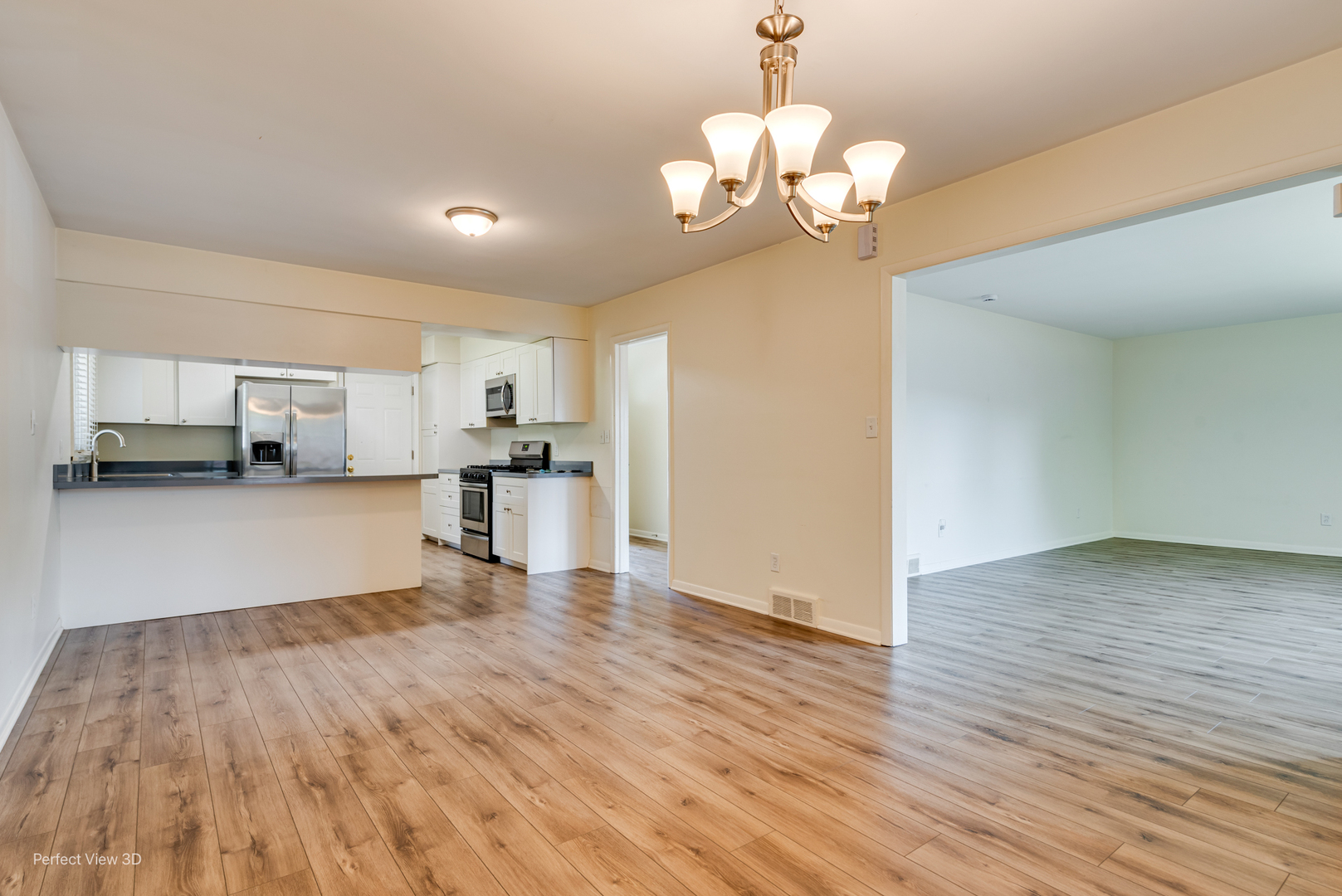 248 West Kennedy Road Braidwood, IL 60408 - Photo 4 of 26 a view of empty room with wooden floor