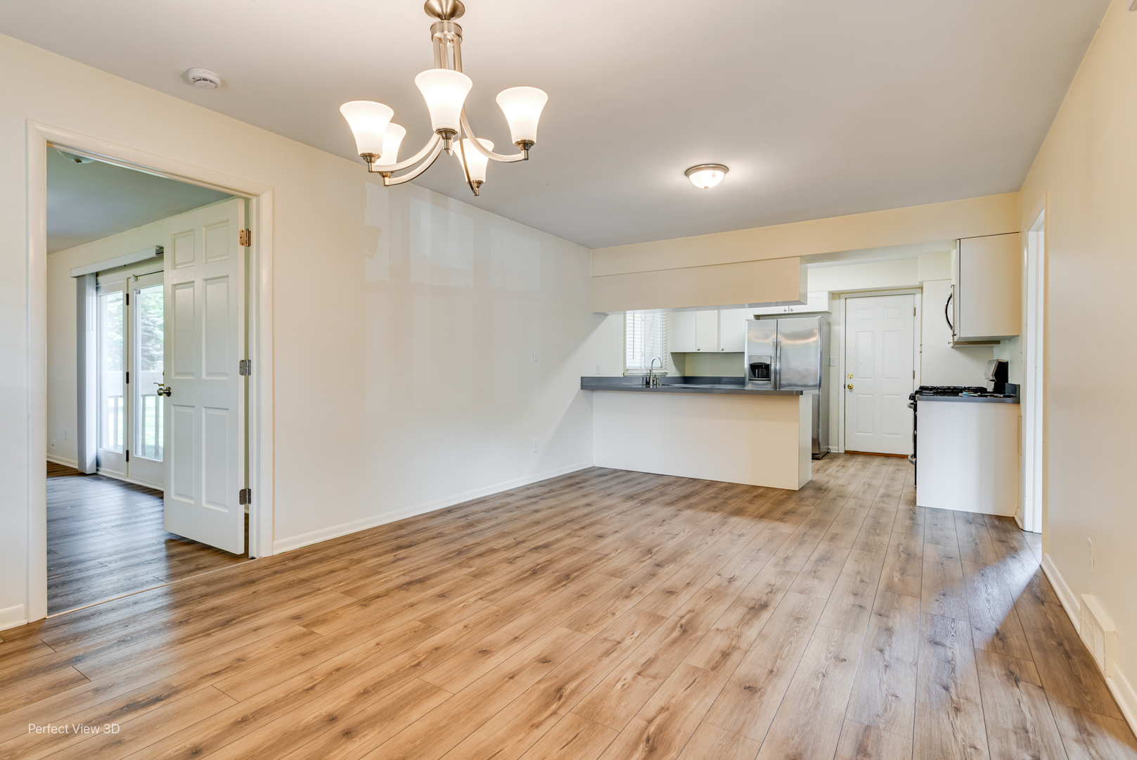 248 West Kennedy Road Braidwood, IL 60408 - Photo 5 of 26 a view of a kitchen with a dishwasher cabinets and wooden floor