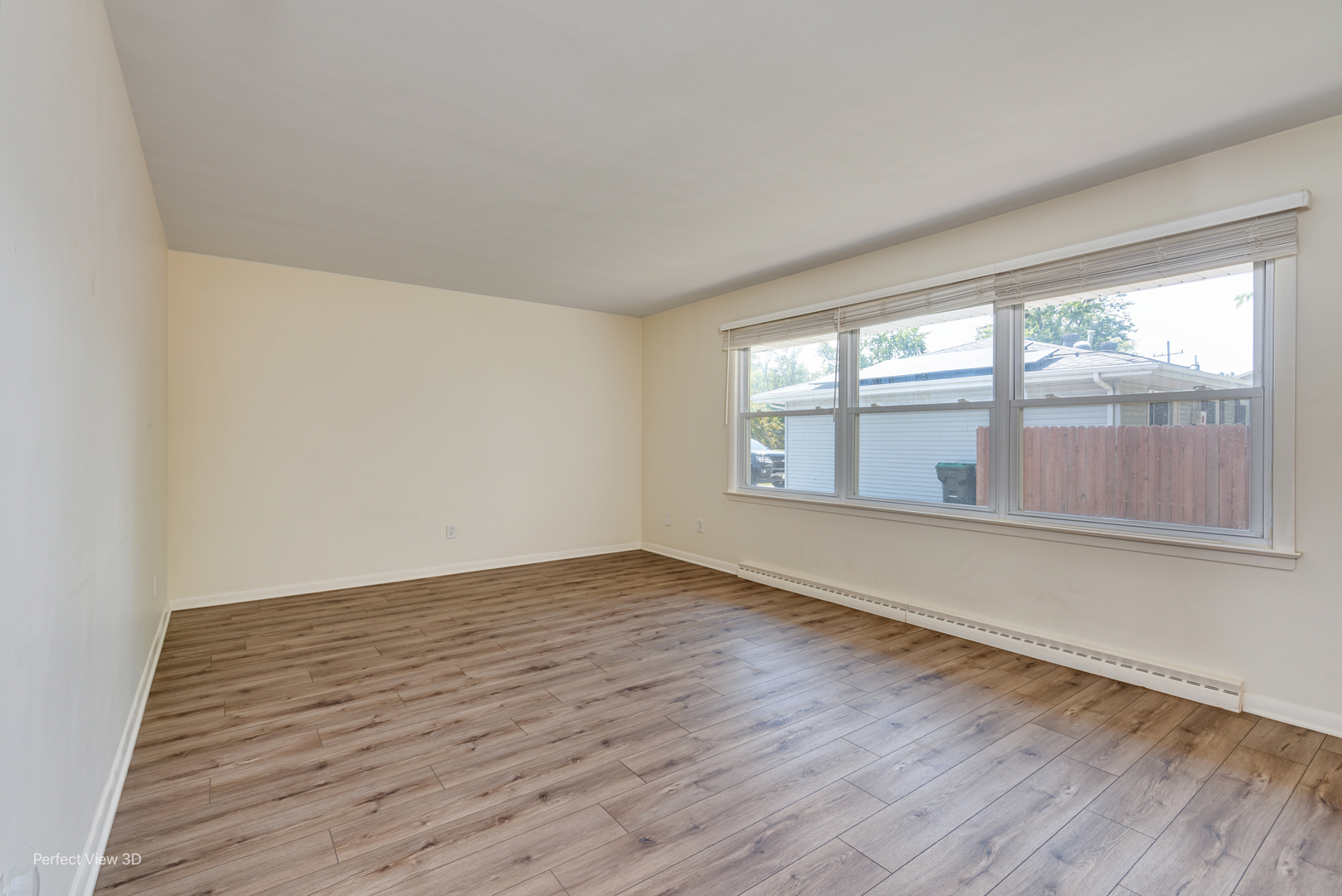 248 West Kennedy Road Braidwood, IL 60408 - Photo 10 of 26 wooden floor in an empty room with a window