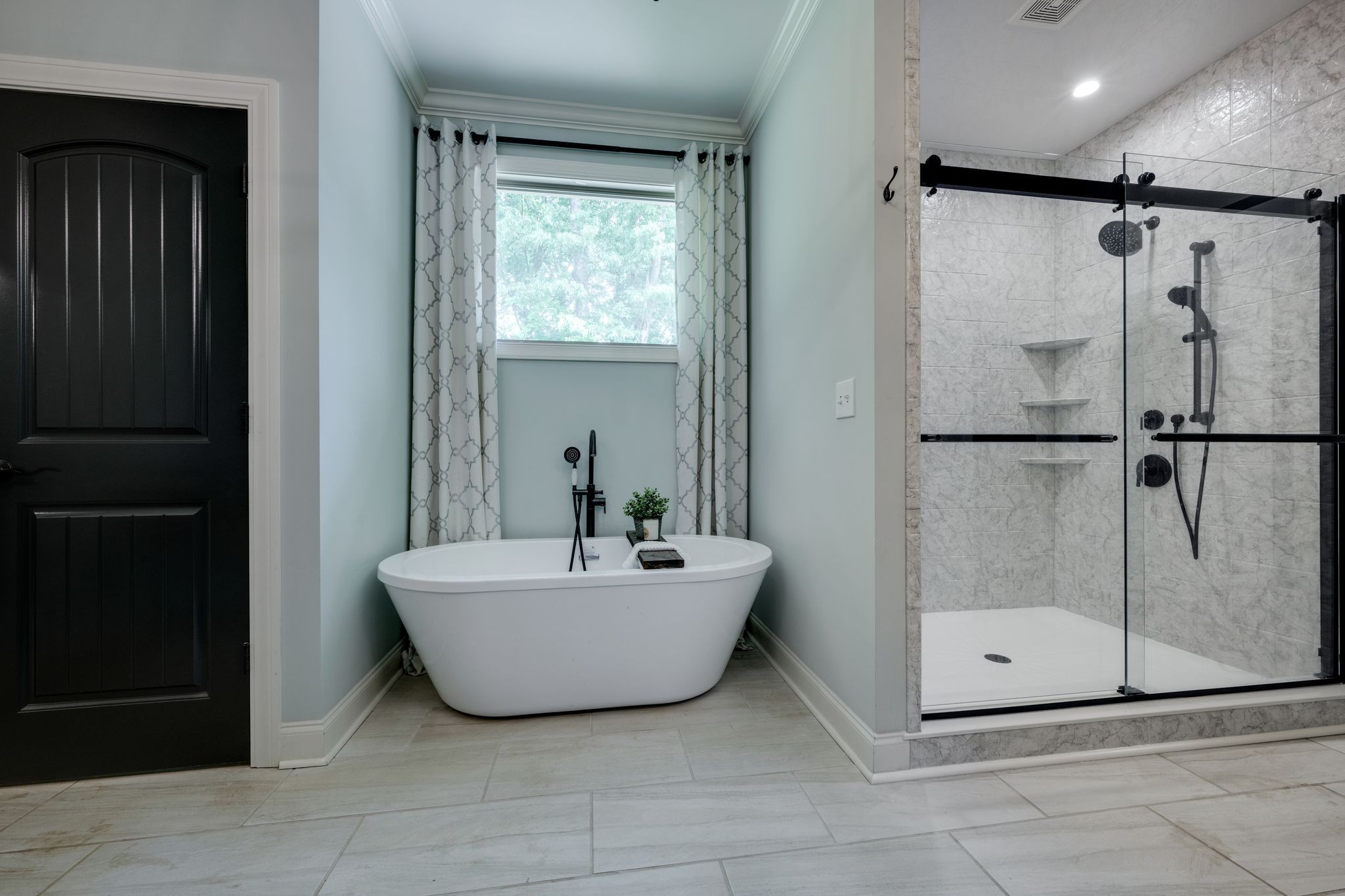 1092 Meeks Cemetery Road Burns, TN 37029 - Photo 26 of 61 a bathroom with a bathtub and shower