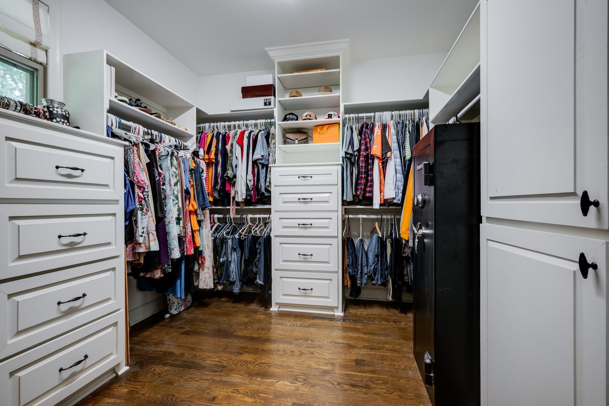1092 Meeks Cemetery Road Burns, TN 37029 - Photo 29 of 61 a view of walk in closet with clothes and shoes