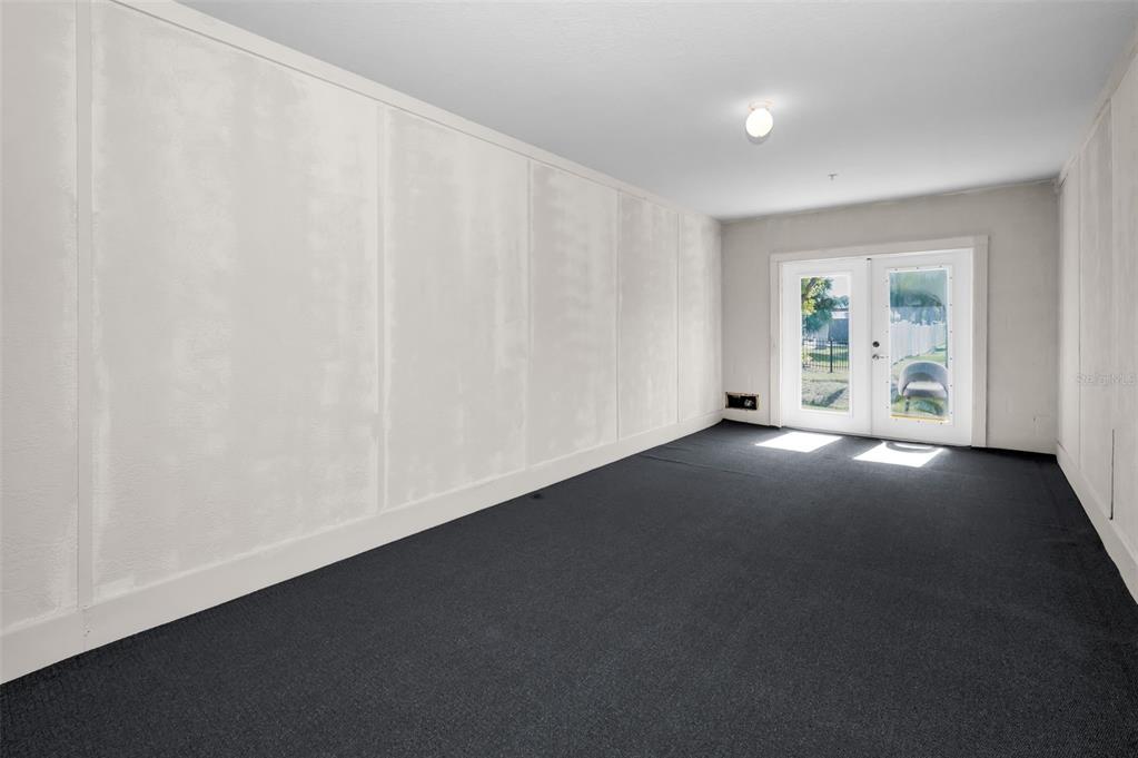 5064 Royal Palms Way, Unit 204 New Port Richey, FL 34652 - Photo 39 of 89 an empty room with windows