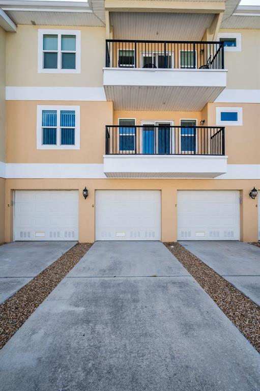 5064 Royal Palms Way, Unit 204 New Port Richey, FL 34652 - Photo 79 of 89 a view of a house with a balcony