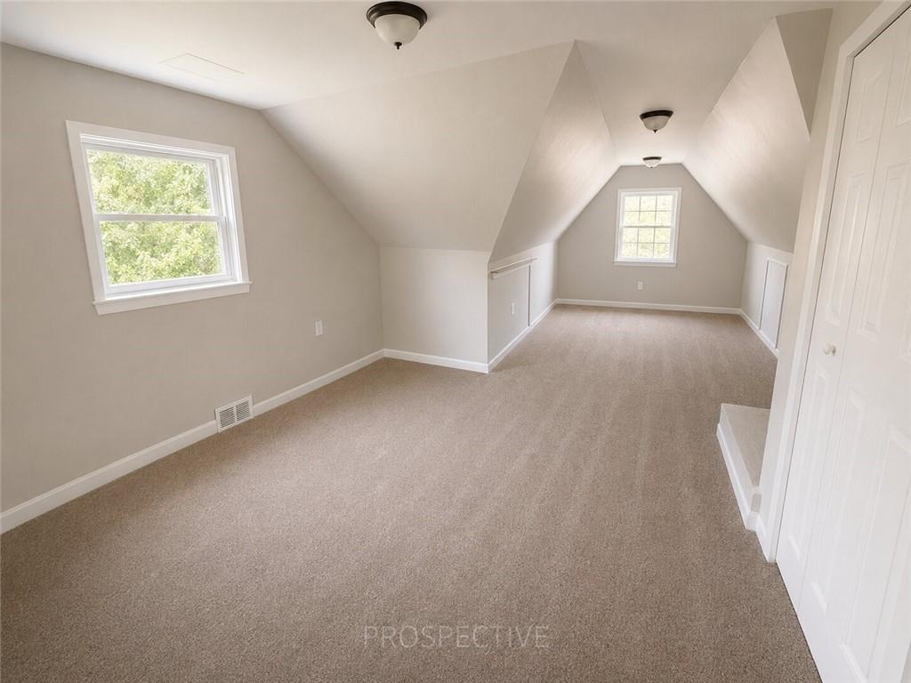 3079 Mt Troy Road Pittsburgh, PA 15212 - Photo 22 of 30 an empty room with windows and closet
