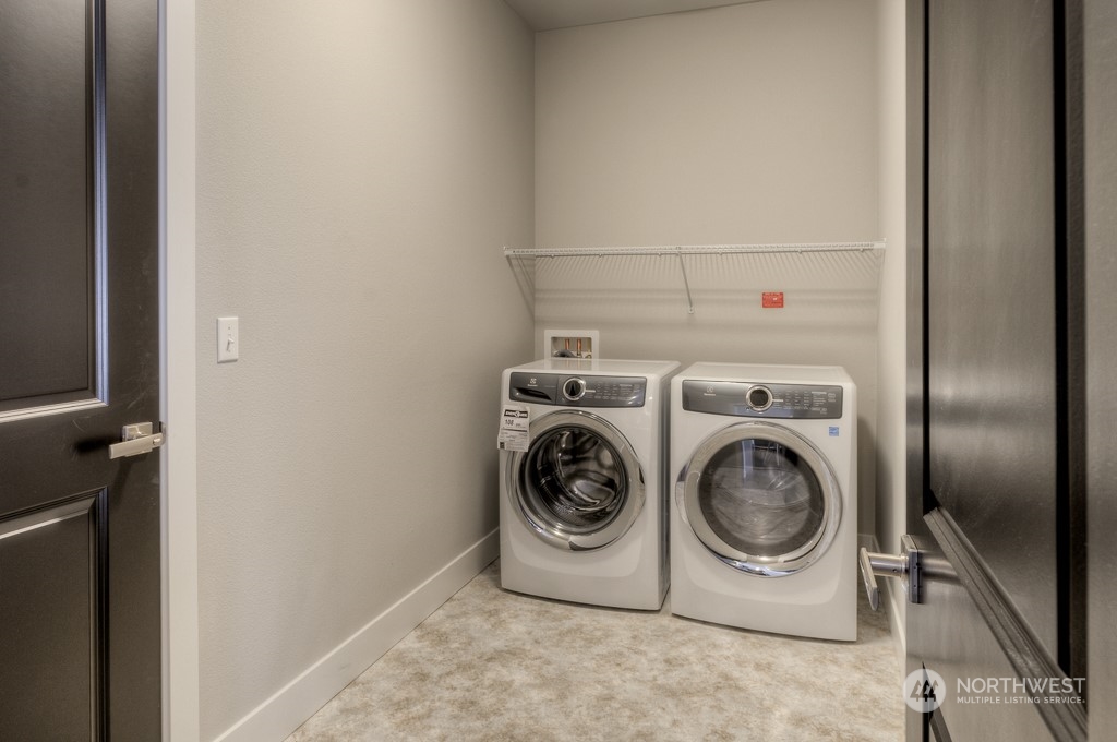 2010 228th Place Southwest, Unit 49 Bothell, WA 98021 - Photo 22 of 25 a utility room with dryer and washer