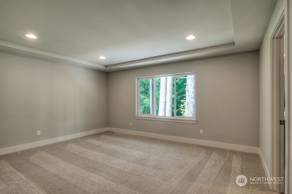 2010 228th Place Southwest, Unit 49 Bothell, WA 98021 - Photo 4 of 25 an empty room with windows