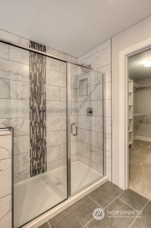 2010 228th Place Southwest, Unit 49 Bothell, WA 98021 - Photo 6 of 25 a bathroom with a shower
