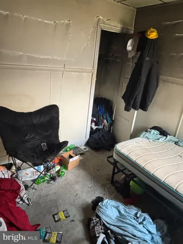 a room with furniture and a flat screen tv