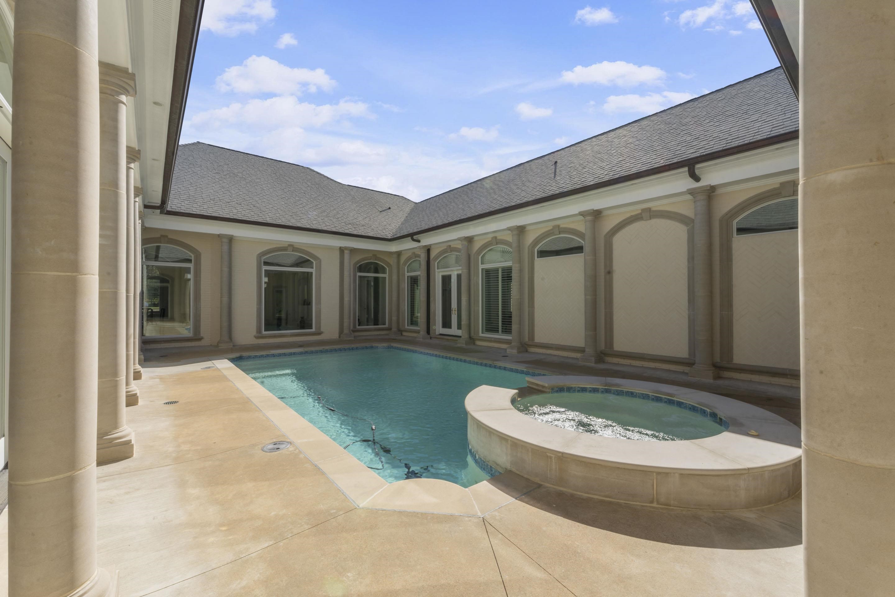 881 Bray Station Road Collierville, TN 38017 - Photo 35 of 40 View of pool with a pool with connected hot tub and a patio area
