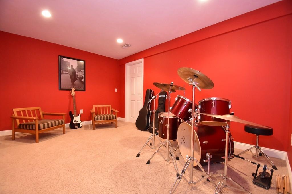 92 Maynard Farm Road Sudbury, MA 01776 - Photo 35 of 41 a view of a room with gym equipment