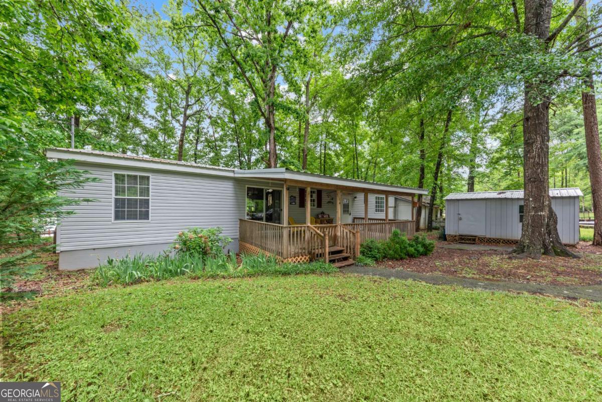 194 Phillips Road Eatonton, GA 31024 - Photo 57 of 57 a view of backyard of house with green space