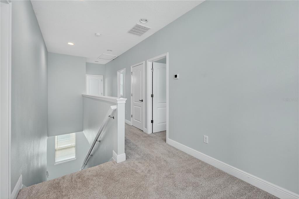 6687 Alder Road Harmony, FL 34773 - Photo 31 of 42 a view of an empty room