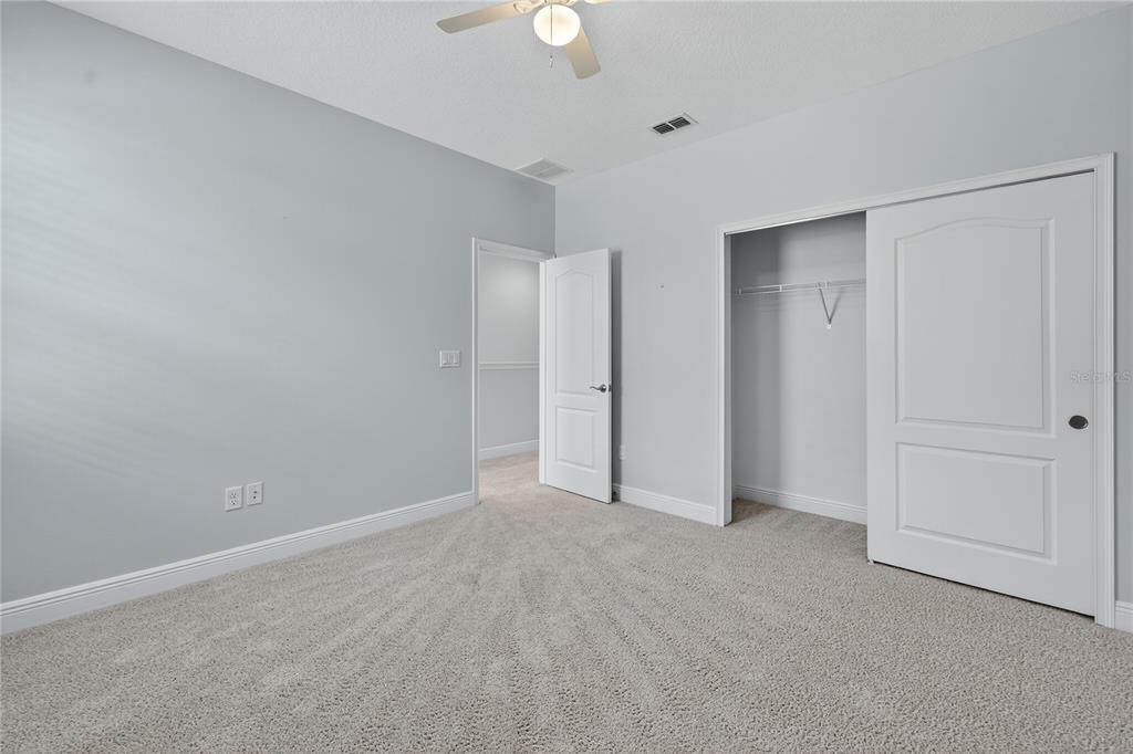 6687 Alder Road Harmony, FL 34773 - Photo 33 of 42 a view of an empty room
