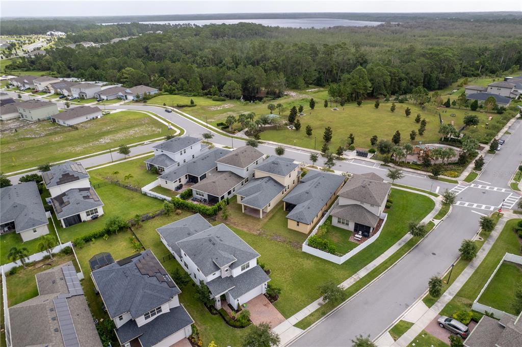 6687 Alder Road Harmony, FL 34773 - Photo 7 of 42 an aerial view of a house with a garden