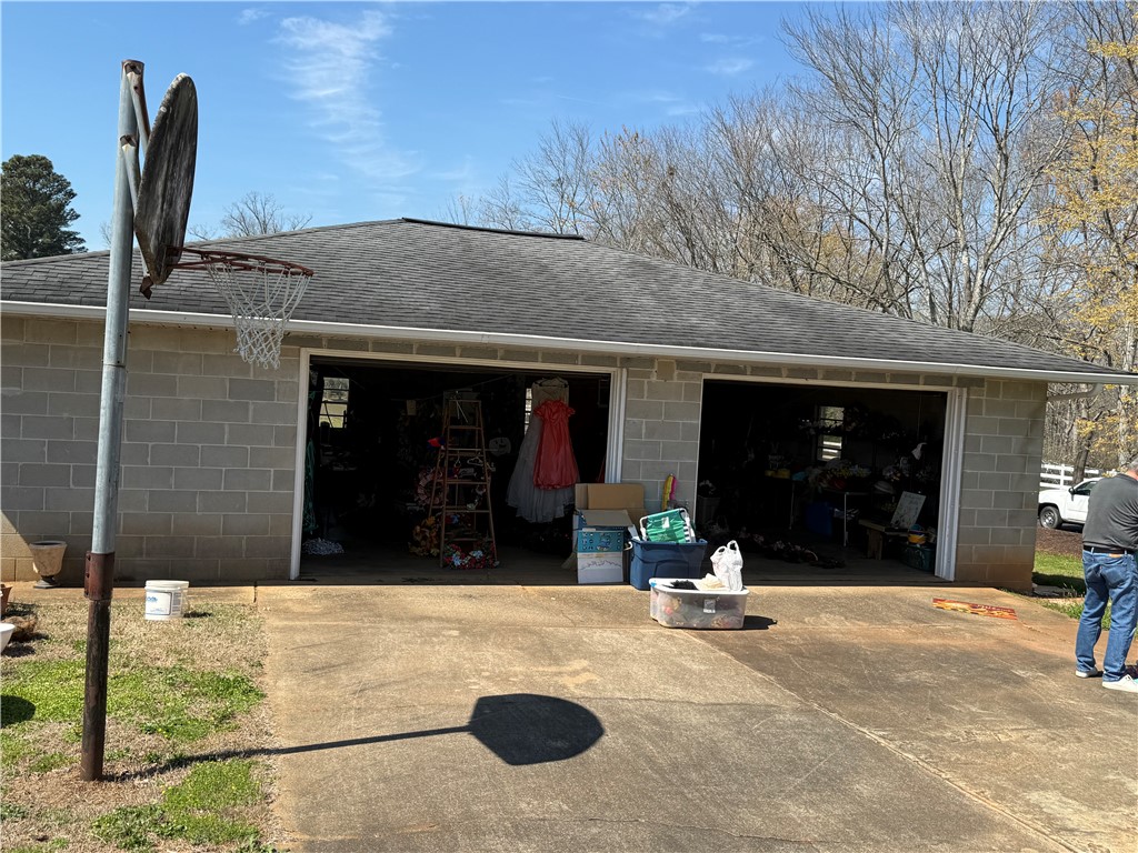 121 Nautical Way Anderson, SC 29625 - Photo 6 of 37 Two-car garage with block construction and a spacious driveway provides ample parking.