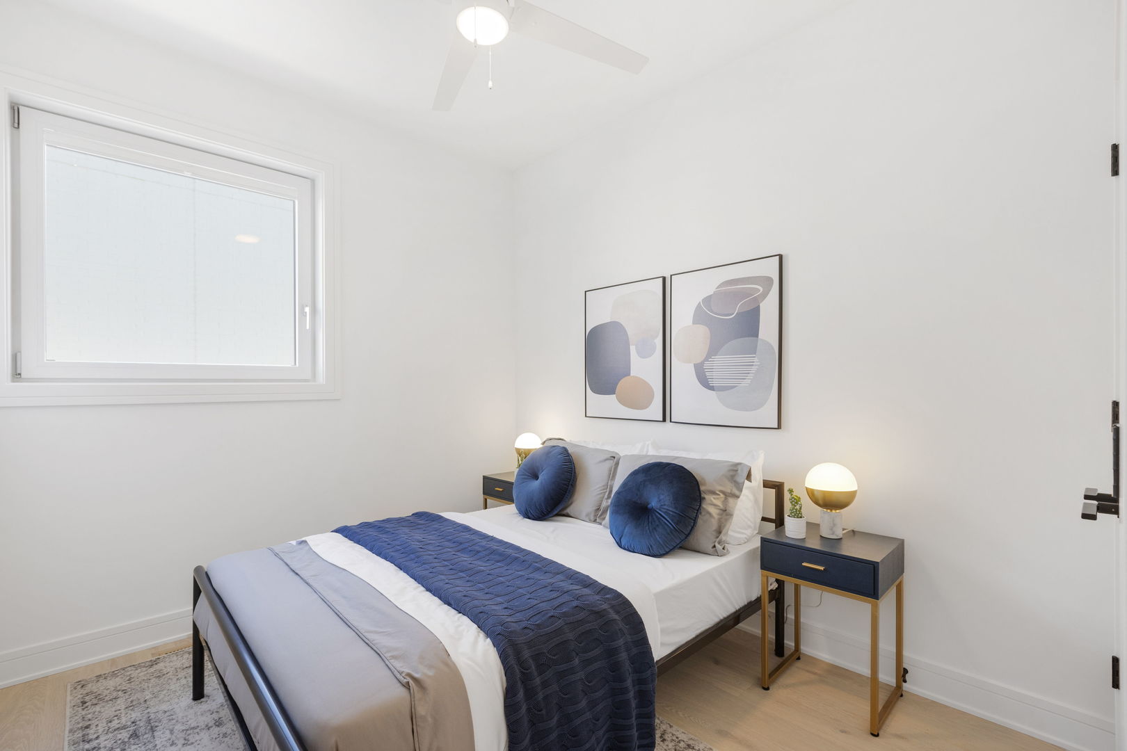 338 East Pershing Road Chicago, IL 60653 - Photo 52 of 86 a bedroom with a bed and a painting on the wall