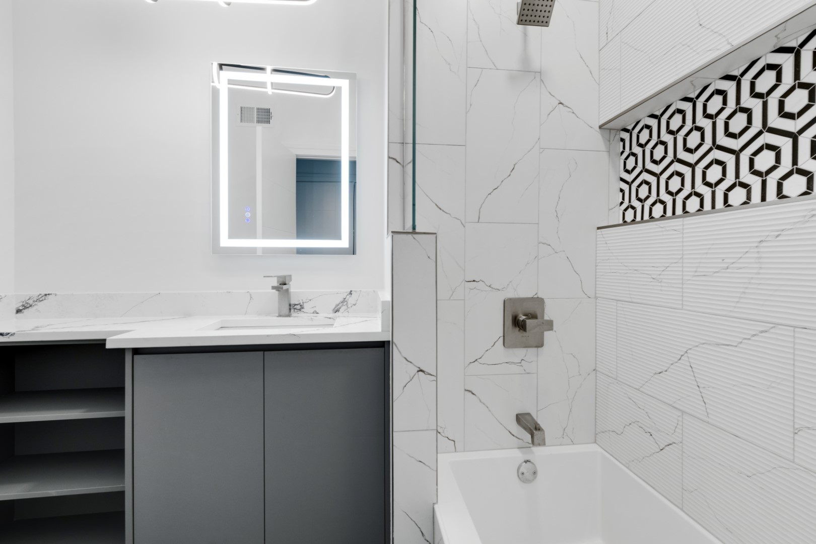 338 East Pershing Road Chicago, IL 60653 - Photo 59 of 86 a bathroom with a sink and a bathtub