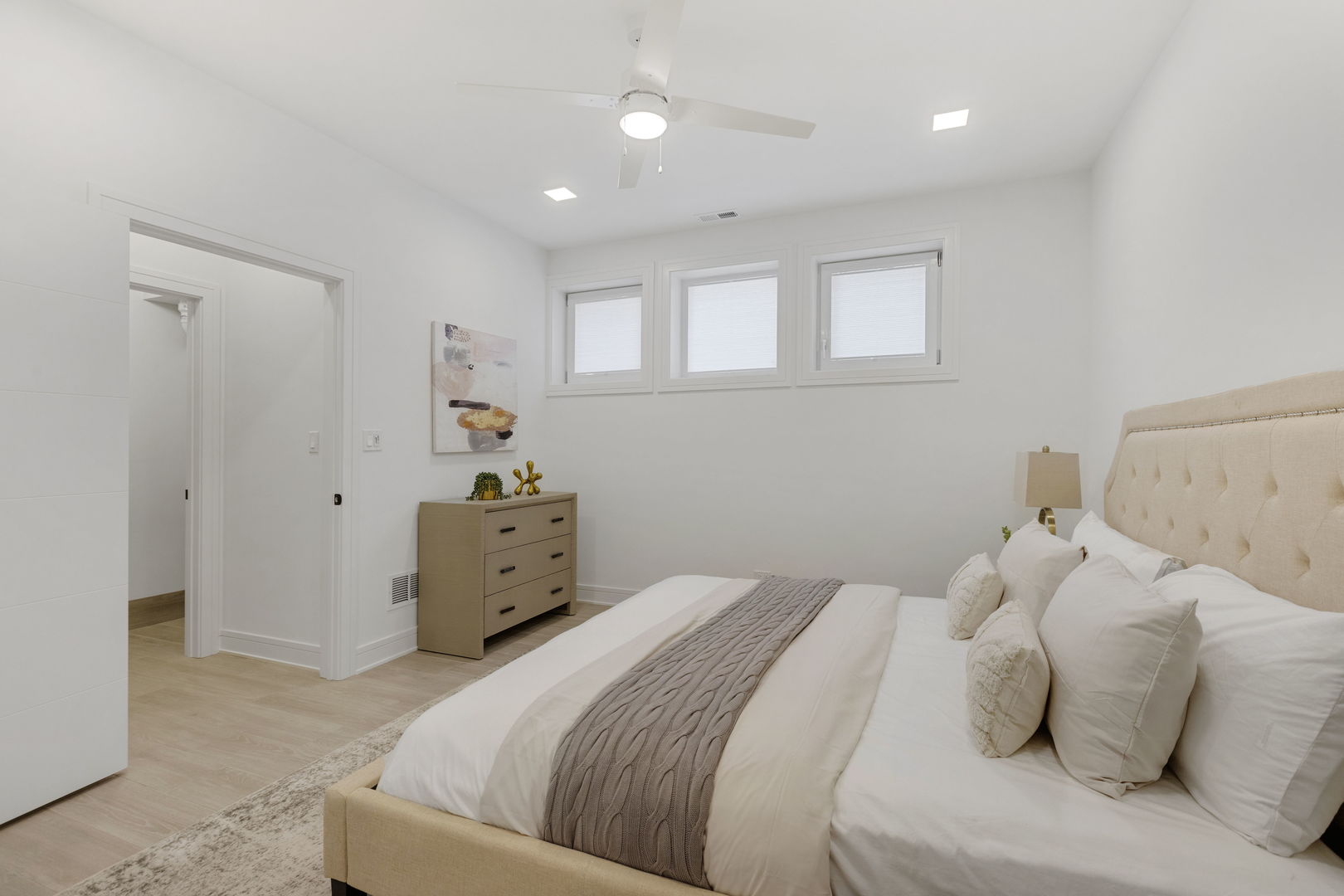 338 East Pershing Road Chicago, IL 60653 - Photo 62 of 86 a bedroom with a bed and a refrigerator