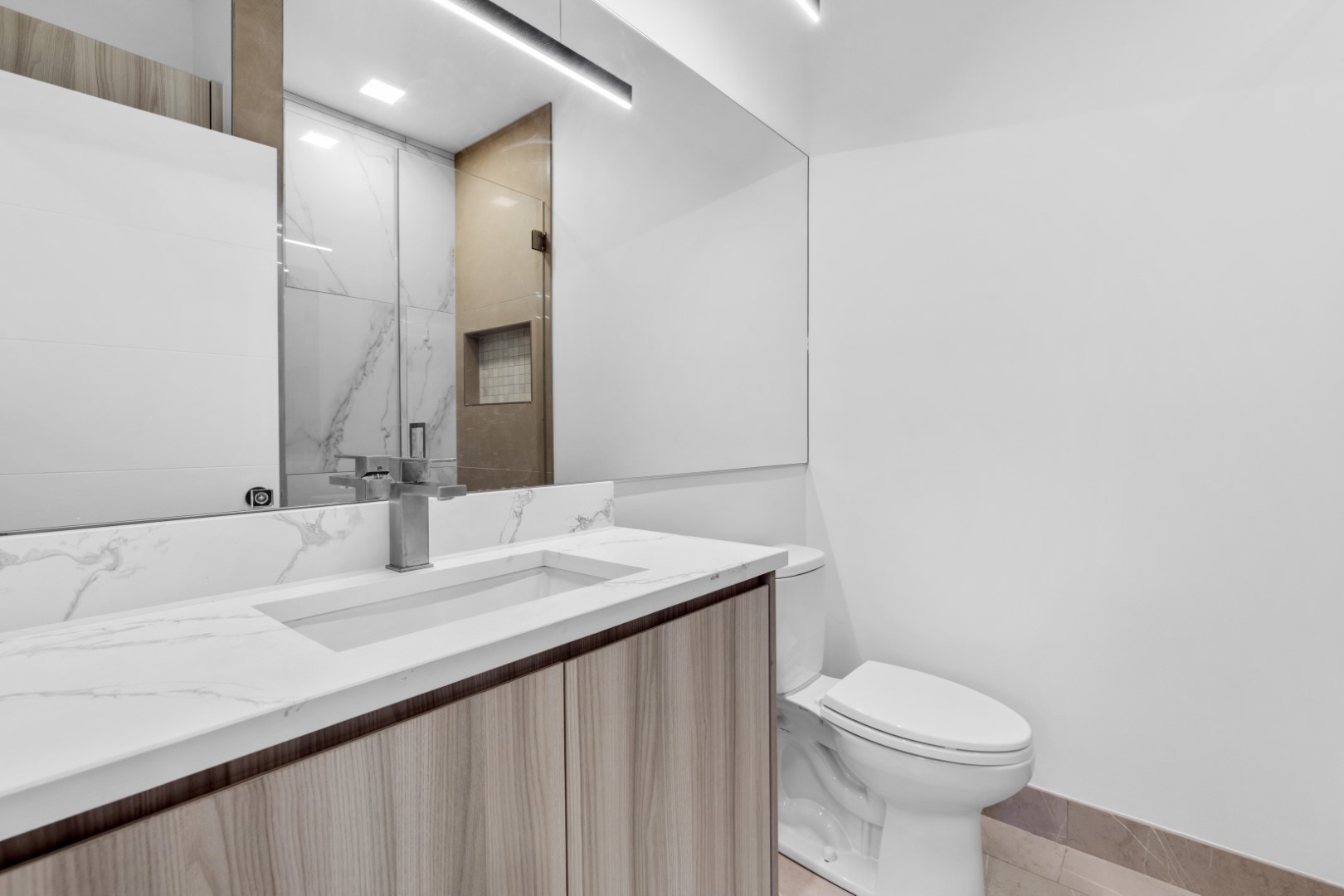 338 East Pershing Road Chicago, IL 60653 - Photo 66 of 86 a bathroom with a sink and a toilet