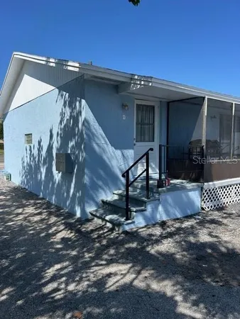 a view of a house with a patio