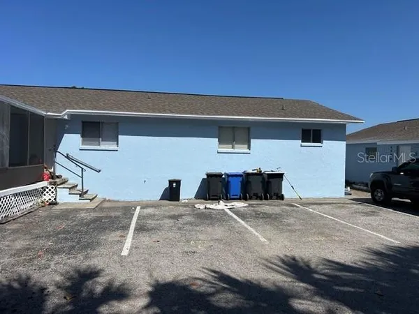 a view of a back yard of the house