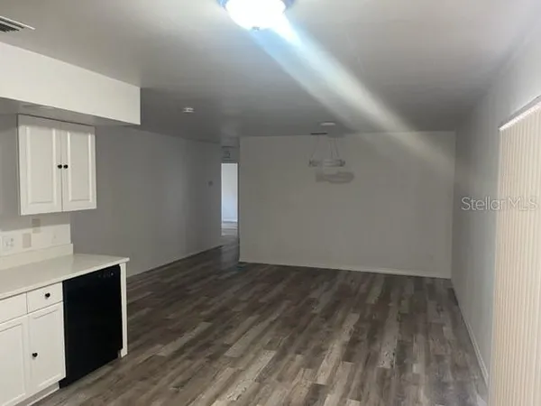 a bathroom with a toilet a sink and shower