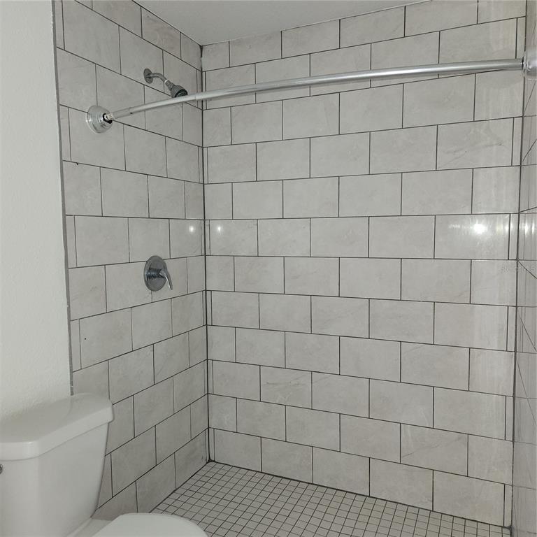 1037 Apollo Beach Boulevard, Unit D Apollo Beach, FL 33572 - Photo 7 of 42 a bathroom with a shower