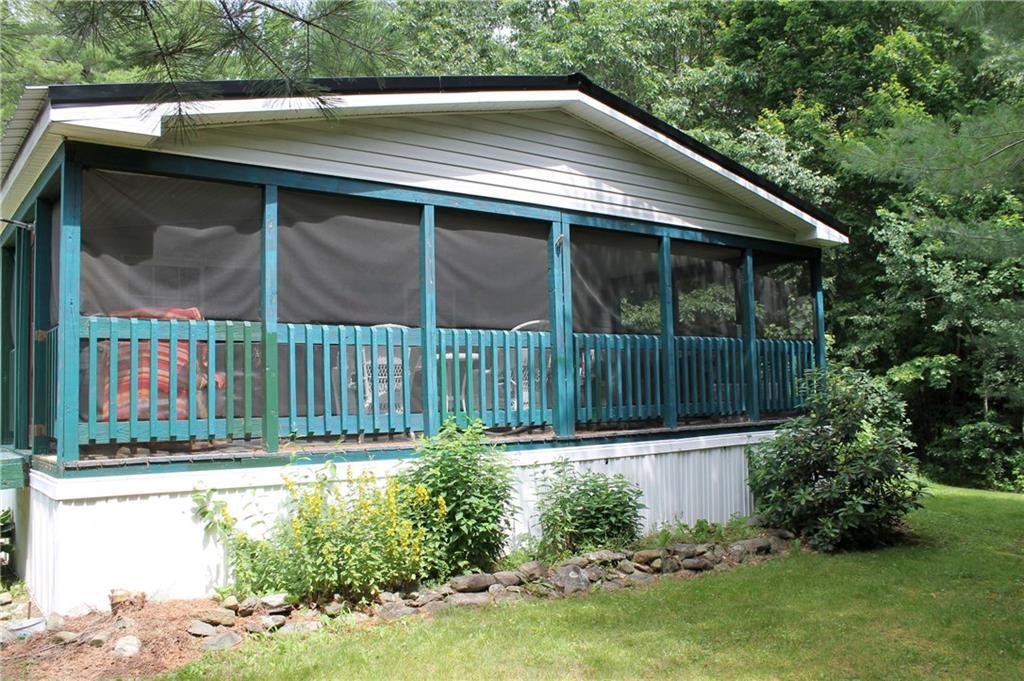 178 Stevens Pond Road Liberty, ME 04949 - Photo 3 of 24 Large screened porch.