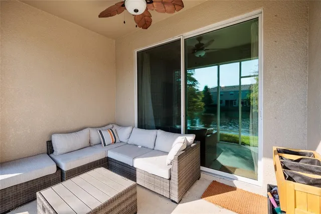 a view of swimming pool with outdoor seating