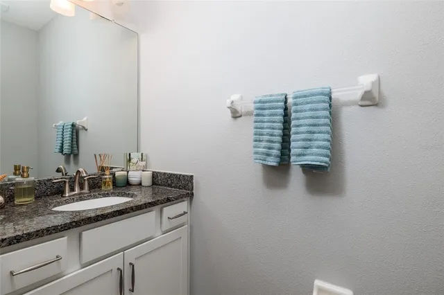 a living room with furniture and white walls