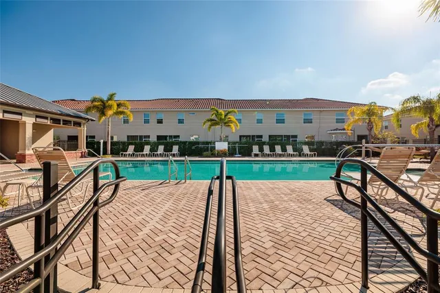 an aerial view of house with yard