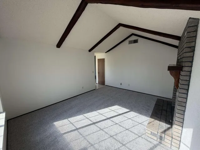 a living room with a fireplace