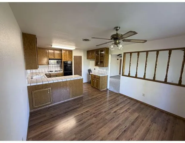 a view of an empty room with glass door