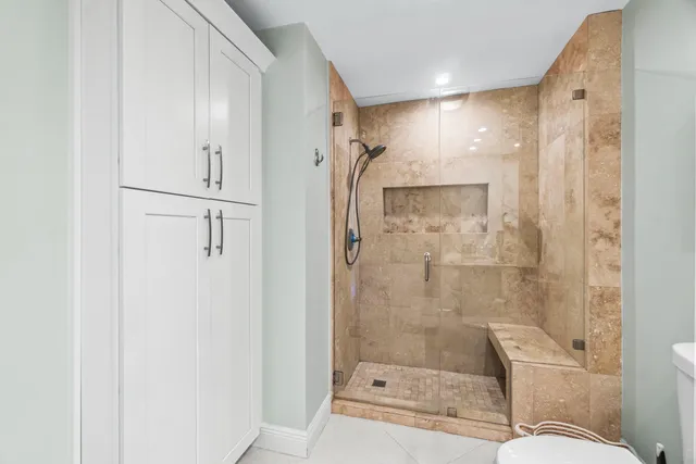 a view of a kitchen cabinets and a stove