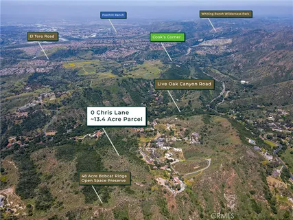 an aerial view of residential house and green space