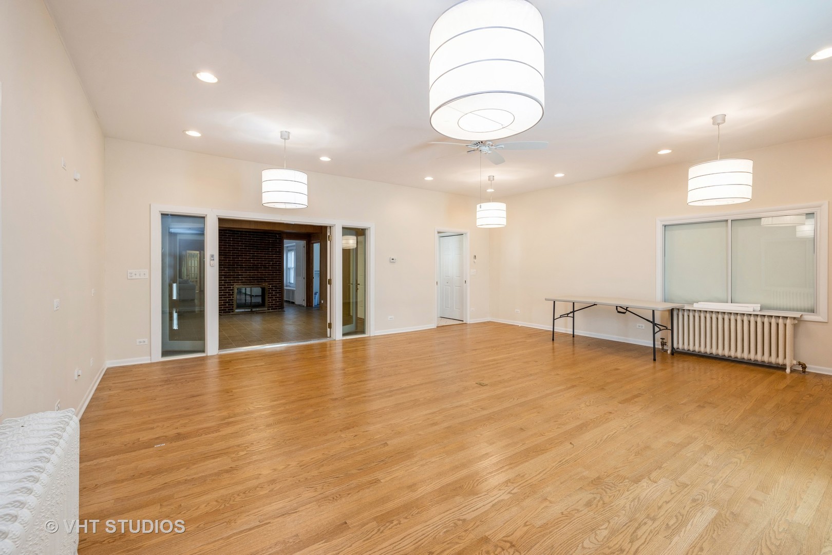189 North Delaplaine Road Riverside, IL 60546 - Photo 4 of 19 a view of an empty room with window and kitchen view