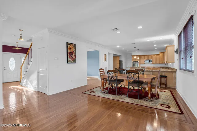a kitchen with a stove sink and cabinets