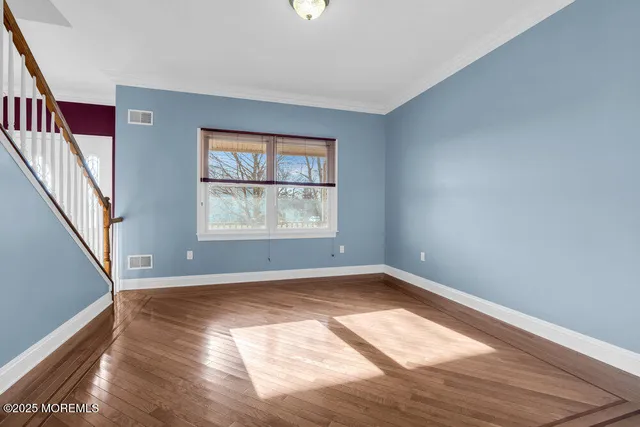 a view of a lake with houses in the back