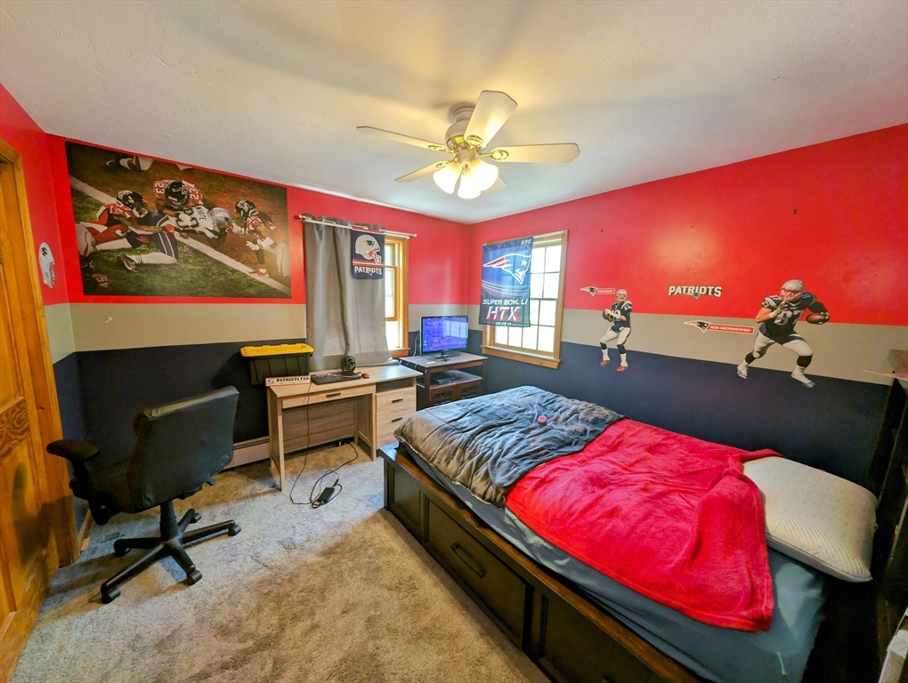 7 Robbins Road Charlton, MA 01507 - Photo 16 of 28 a bed room with a bed and furniture