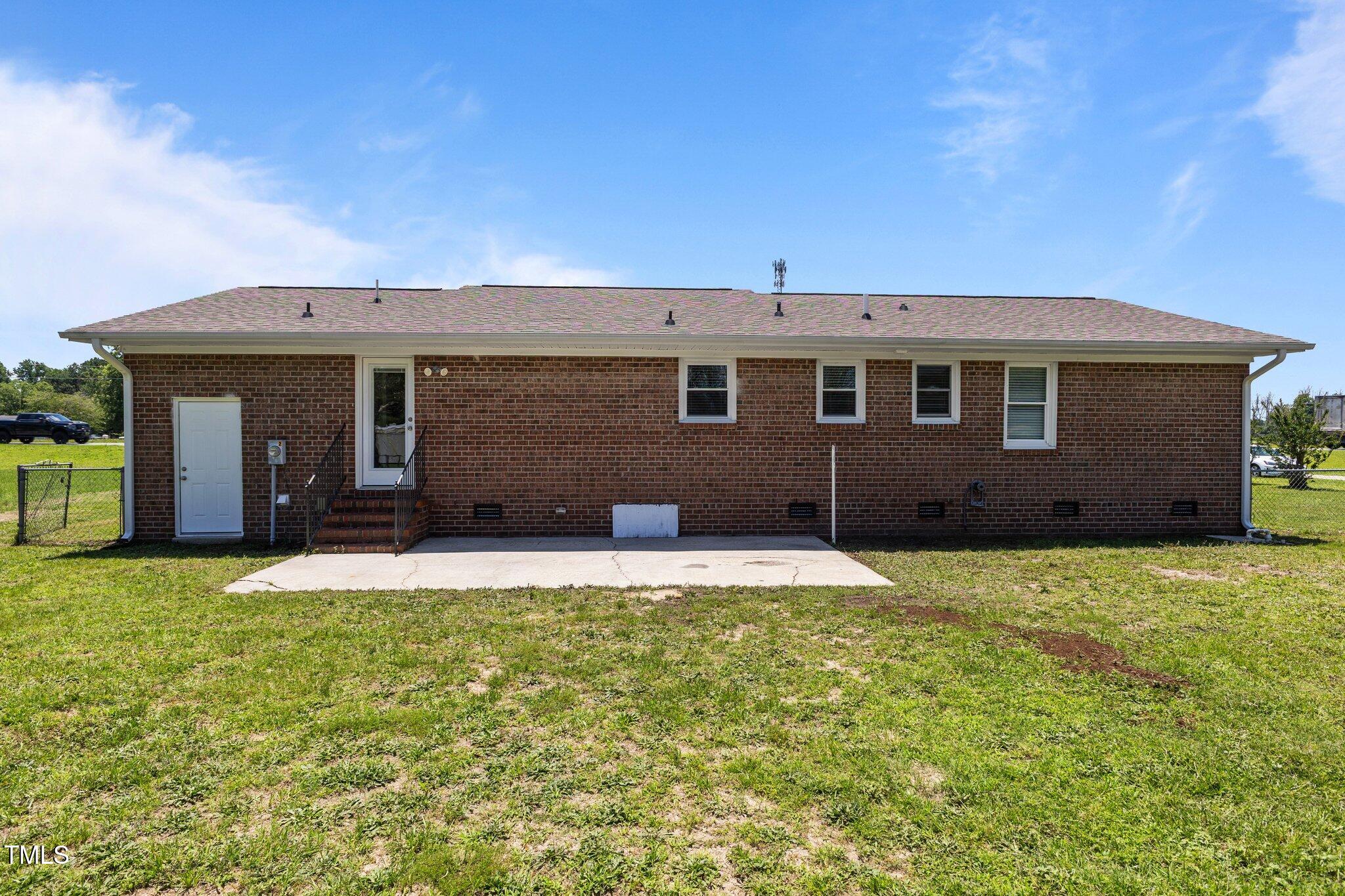 8431 Clinton Road Stedman, NC 28391 - Photo 21 of 24 a house that has a big yard