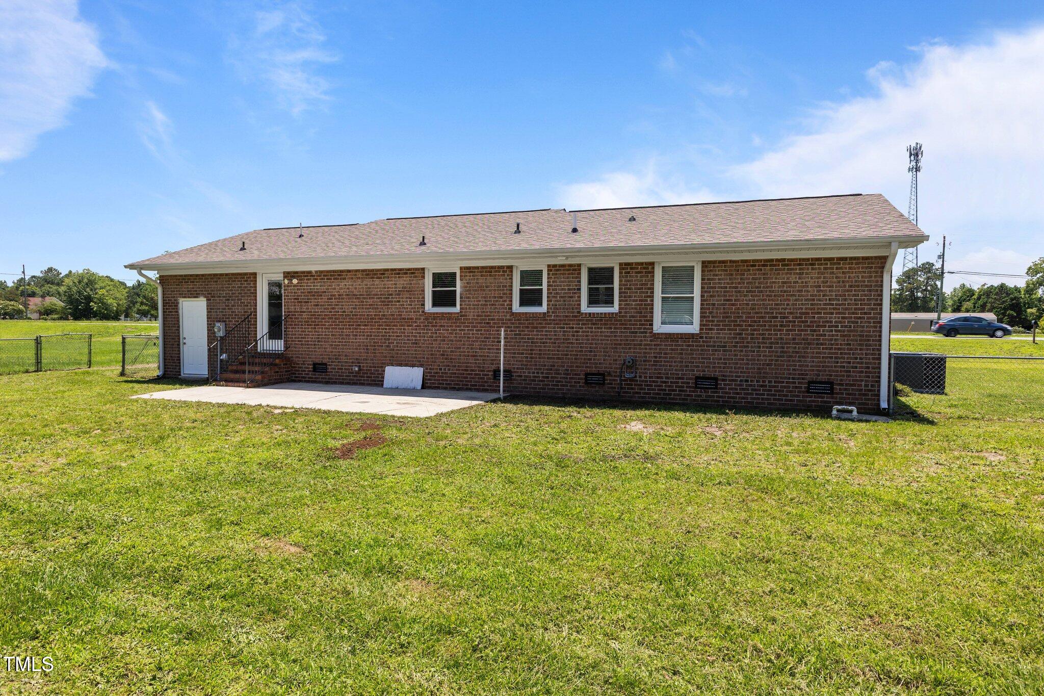 8431 Clinton Road Stedman, NC 28391 - Photo 22 of 24 a house view with a garden space