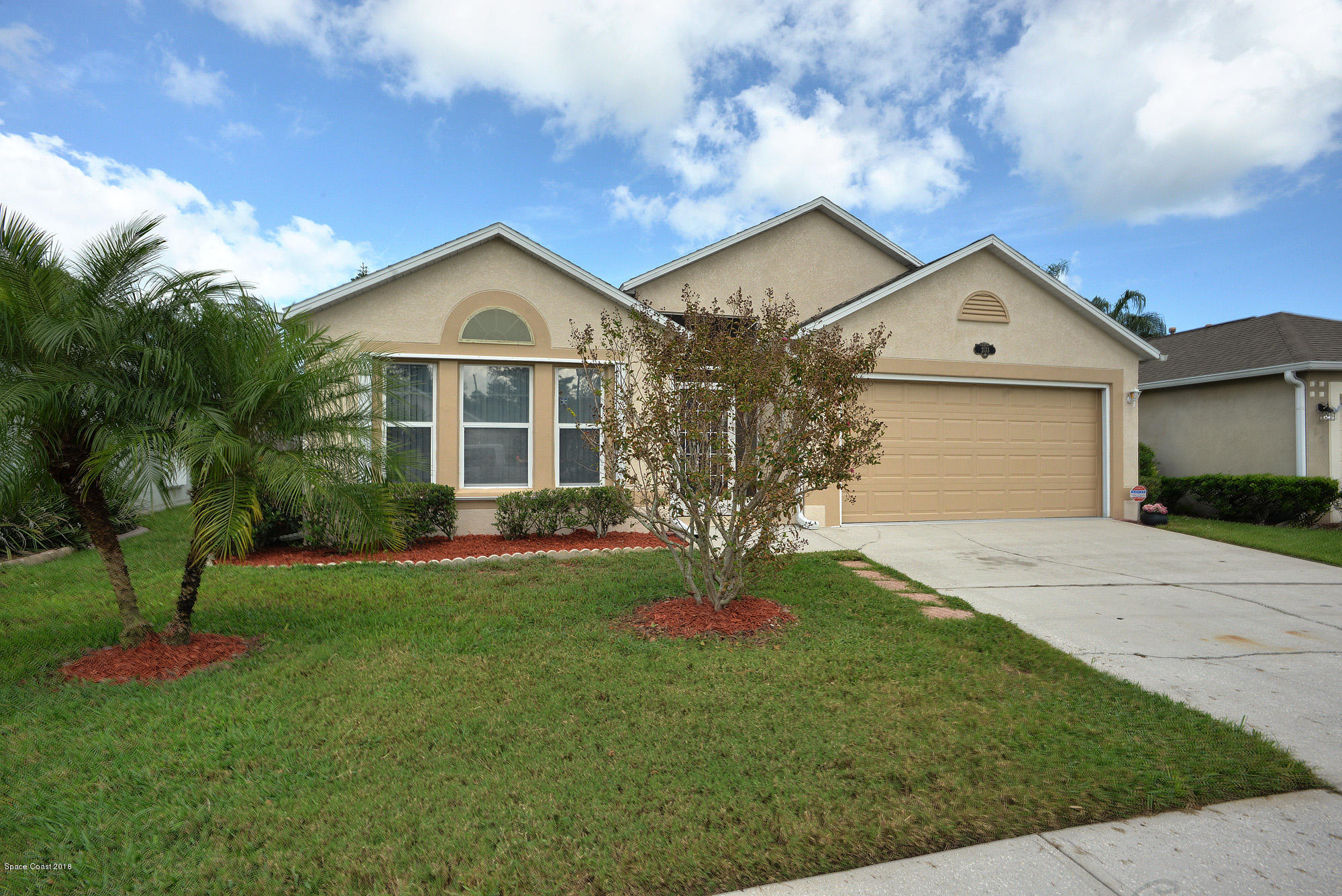 2133 Spring Creek Circle Palm Bay, FL 32905 - Photo 1 of 11 Front