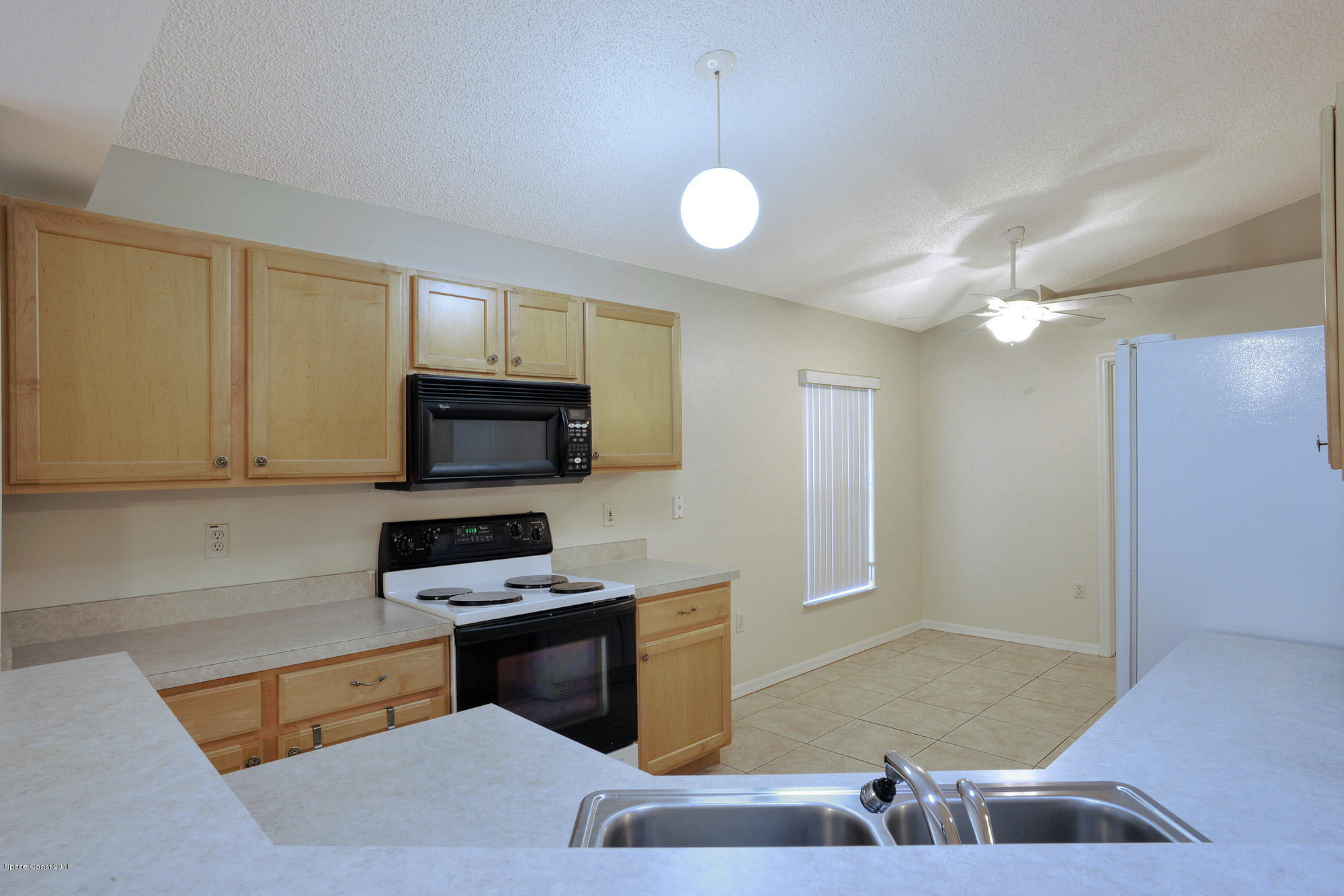 2133 Spring Creek Circle Palm Bay, FL 32905 - Photo 3 of 11 Kitchen