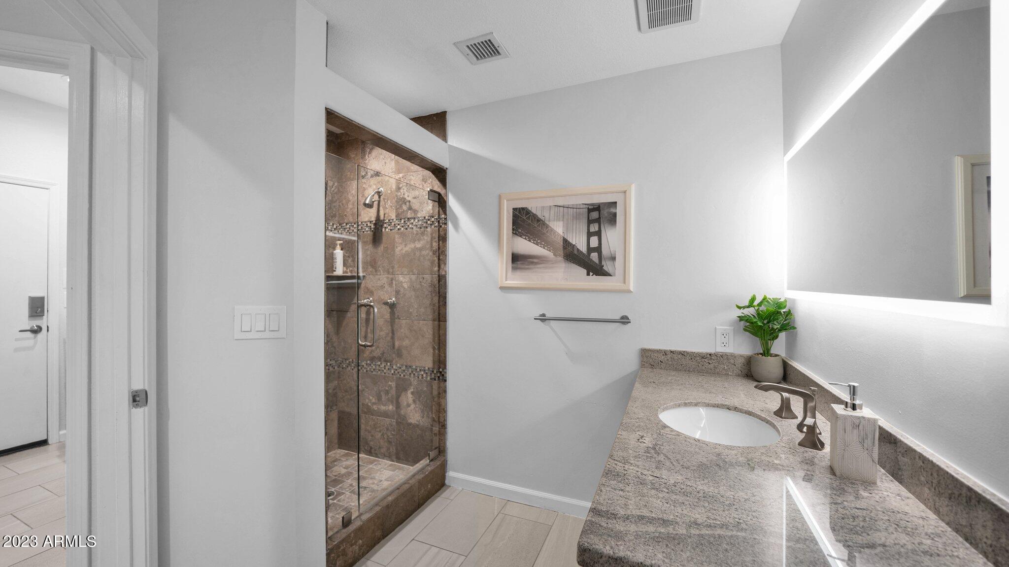 7705 East Doubletree Ranch Road, Unit 33 Scottsdale, AZ 85258 - Photo 28 of 59 GUEST BATH W WALK IN SHOWER