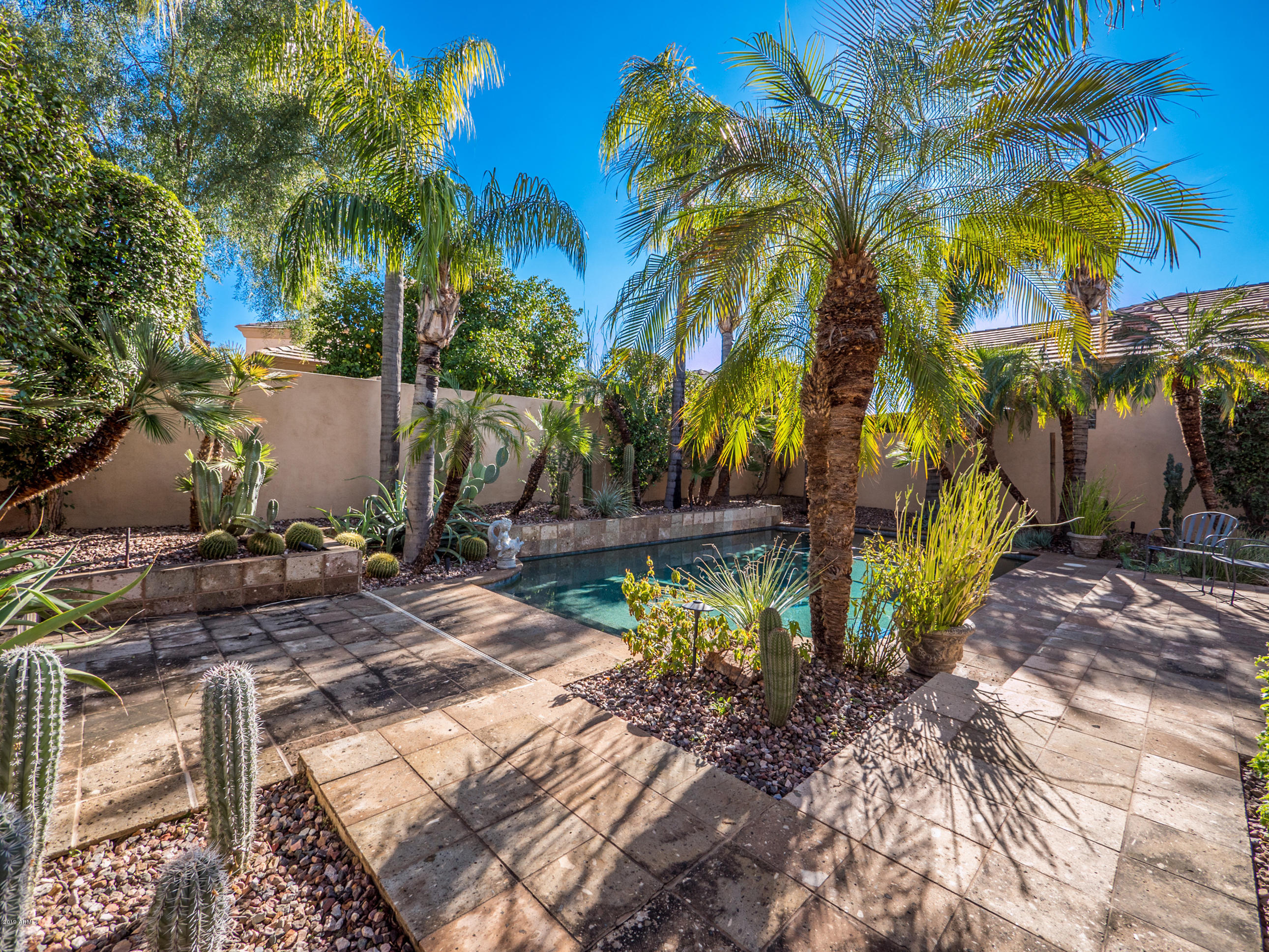7705 East Doubletree Ranch Road, Unit 33 Scottsdale, AZ 85258 - Photo 38 of 59 TILED PATIO
