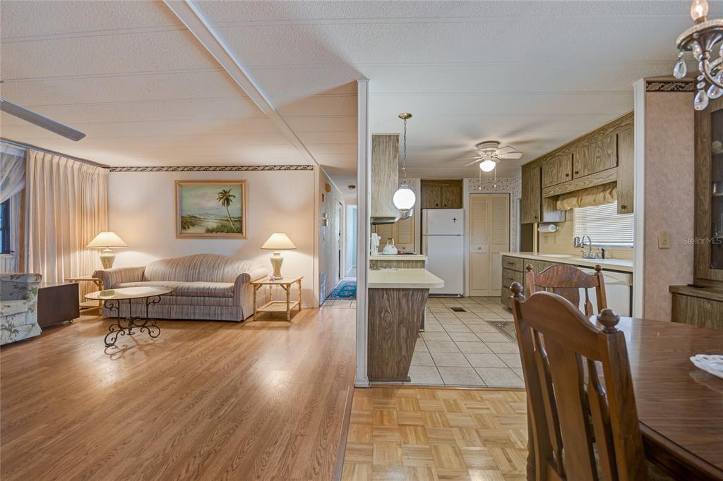 5619 Bayshore Road, Unit 312 Palmetto, FL 34221 - Photo 12 of 40 a living room with furniture and a table