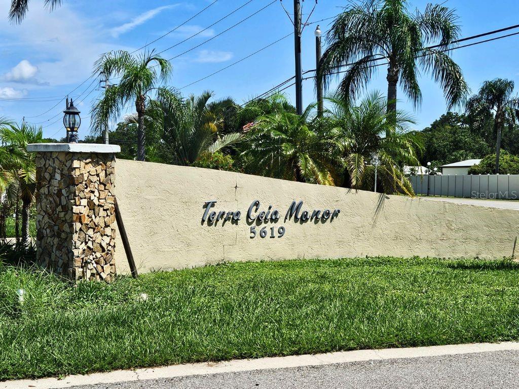 5619 Bayshore Road, Unit 312 Palmetto, FL 34221 - Photo 40 of 40 a sign on the side of the wall